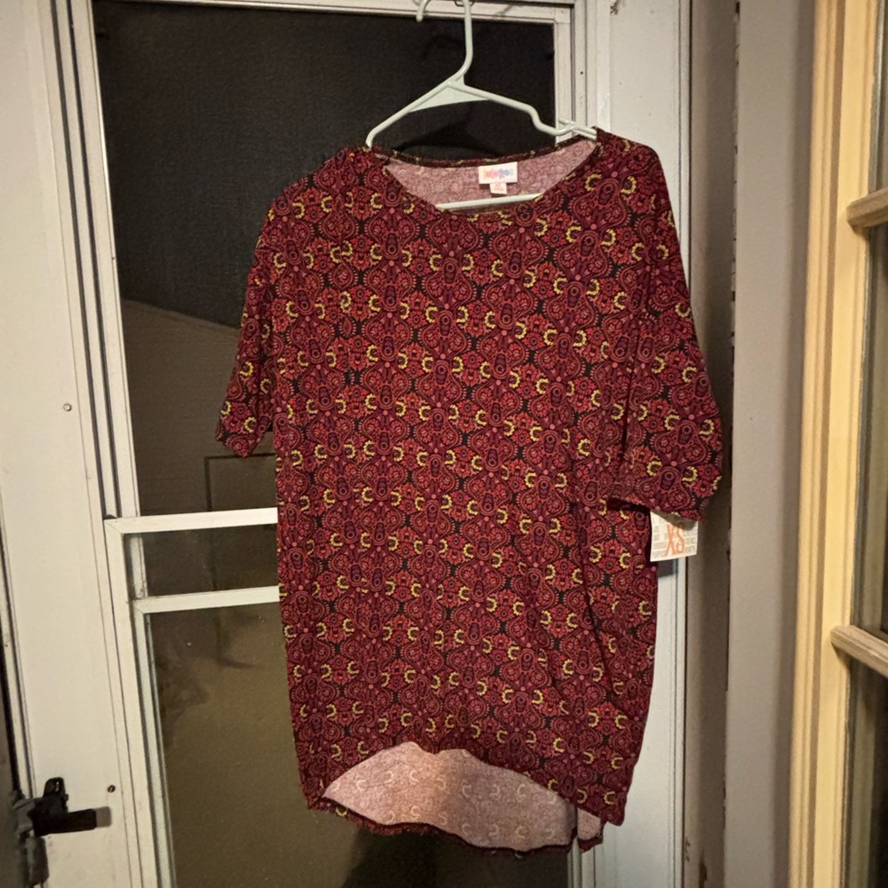 Size XS women’s new with tags. lularoe Patterned Red Top
